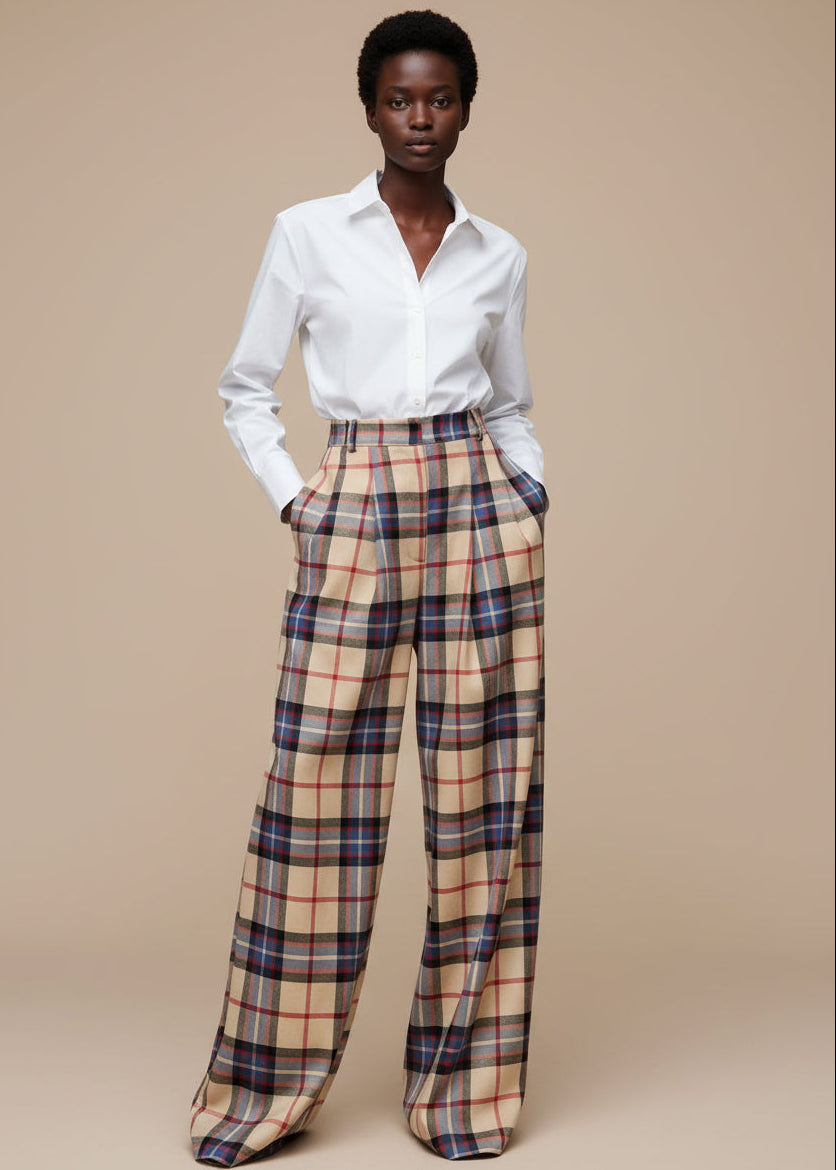 Plaid pants on a mannequin in a store setting