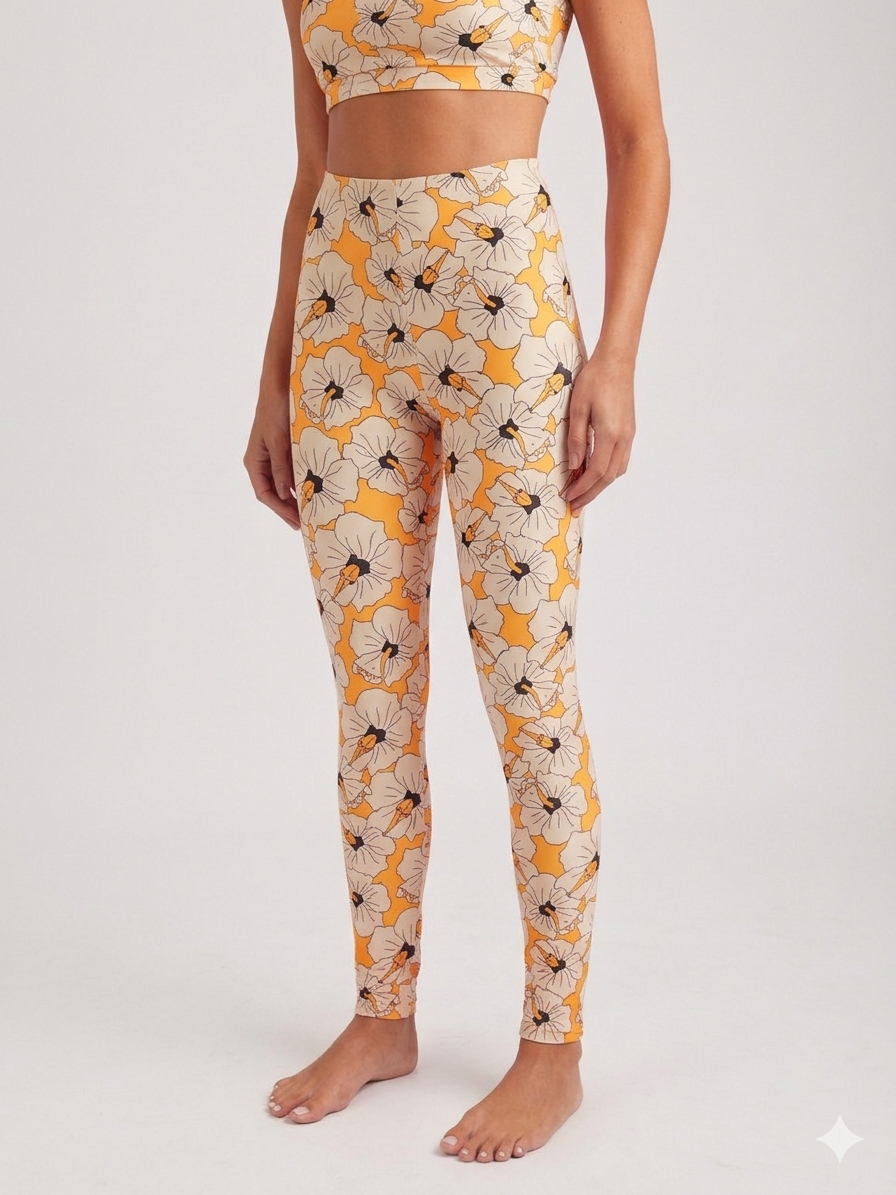 Person wearing a floral leggings and top set on a white background
