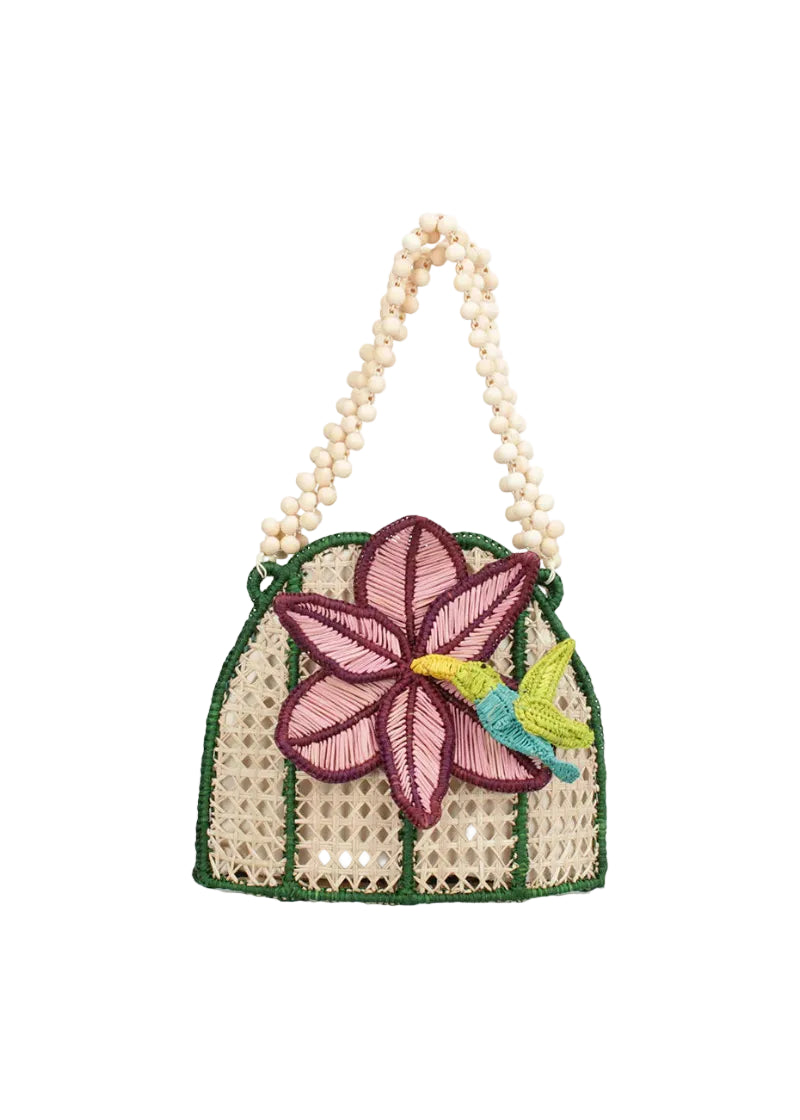 Handbag with floral design and beaded handle on a white background
