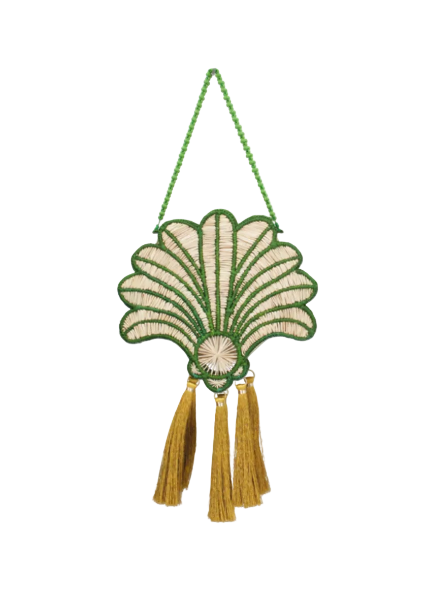 Decorative wall hanging with shell design and tassels on a white background